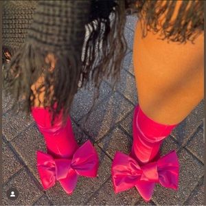 THESE ARE RED BEAUTIFUL NEW BOW TIE BOOTS PERFECT FOR ANY ATTIRE !!